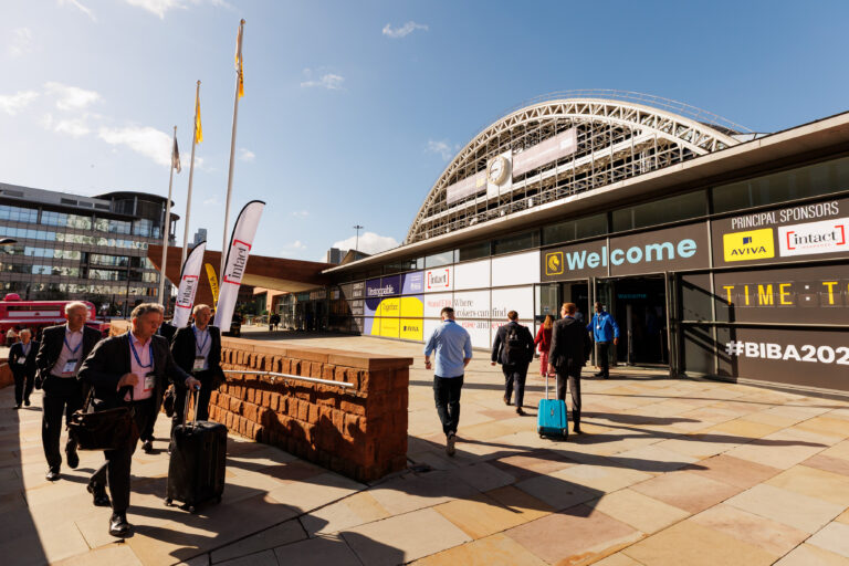 Manchester Central with BIBA and sponsor branding and attendees walking in